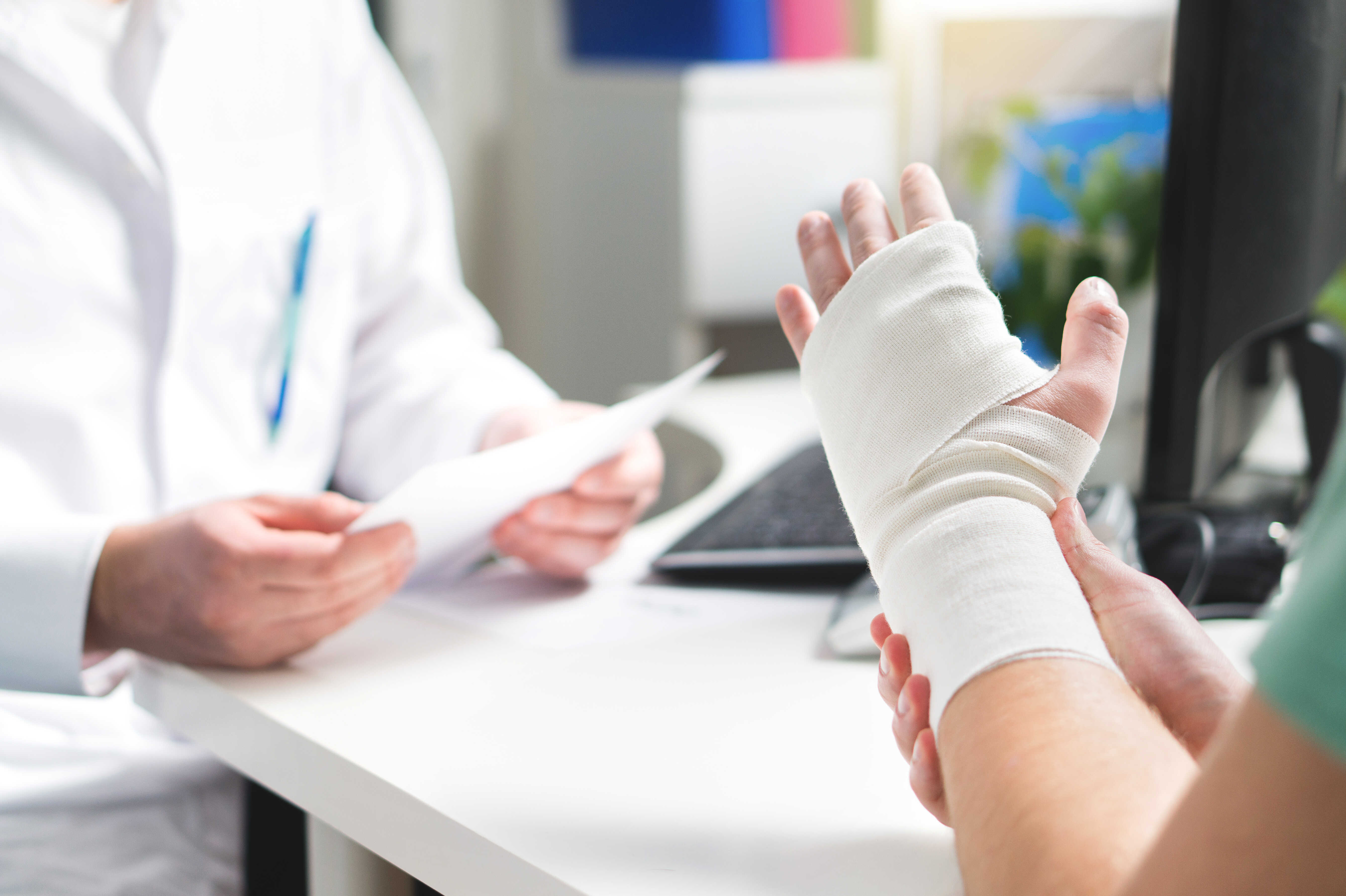 doctor speaking with injured person